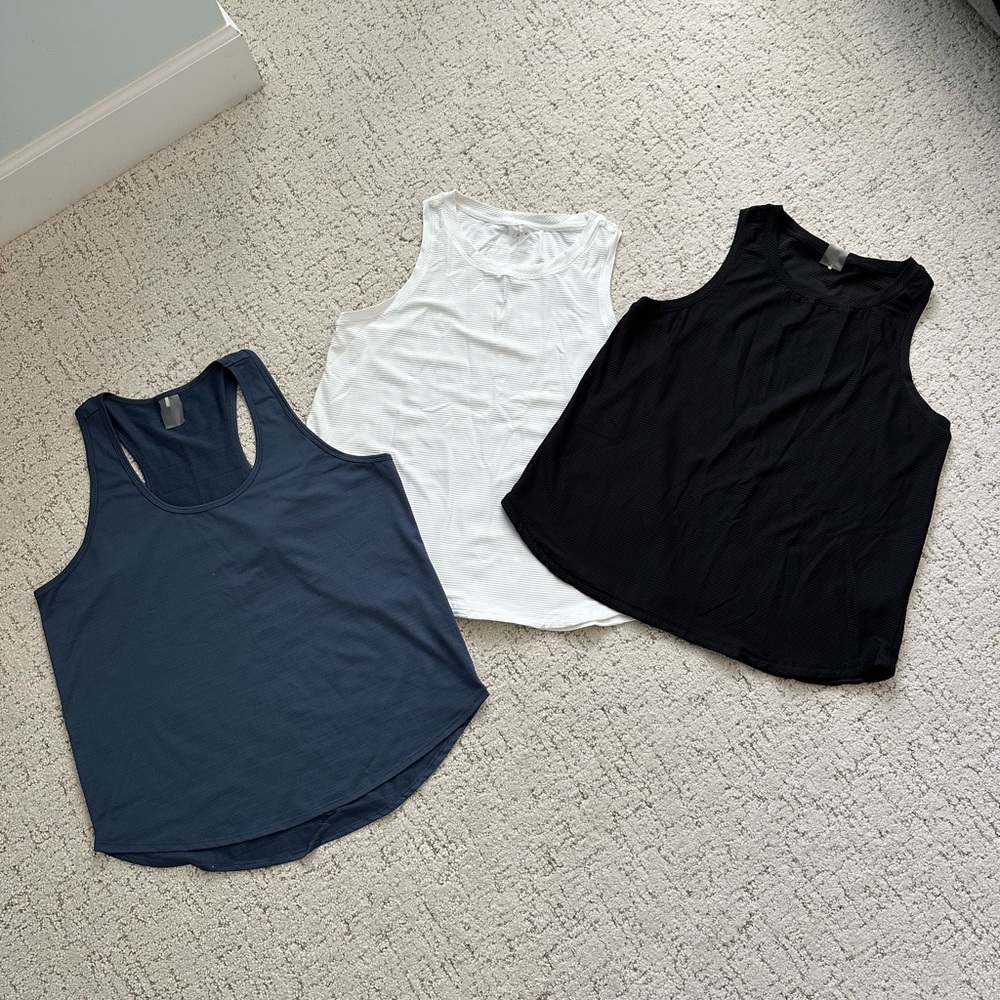 3 Calia by Carrie Underwood workout tops.